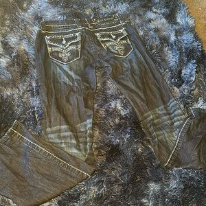 Size 28 in women rock revival jeans